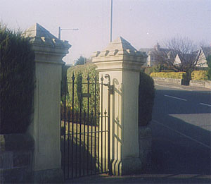 pillars masoned and reinstated in blond sandstone